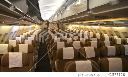 ZURICH, SWITZERLAND - MAR 31st, 2015: An empty economy class cabin, an inside view on a Airbus A330 ZURICH, SWITZERLAND - MAR 31st, 2015: An empty economy class cabin, an inside view on a Airbus A330 41578118