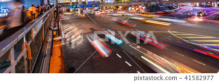 People and traffic crossing a busy intersection in Shibuya, Tokyo, Japan 41582977