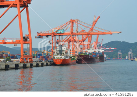 A feeder ship anchored at Busan North Port, South Korea A feeder ship anchored at Busan North Port, South Korea 41591292