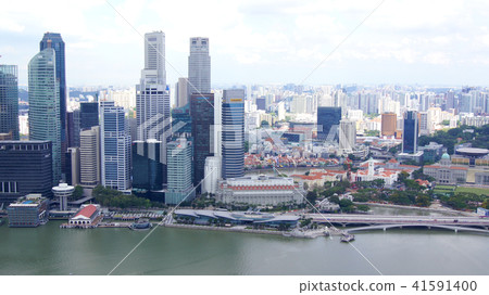 SINGAPORE - APR 2nd 2015: skyline of business district and Marina Bay during the day SINGAPORE - APR 2nd 2015: skyline of business district and Marina Bay during the day 41591400