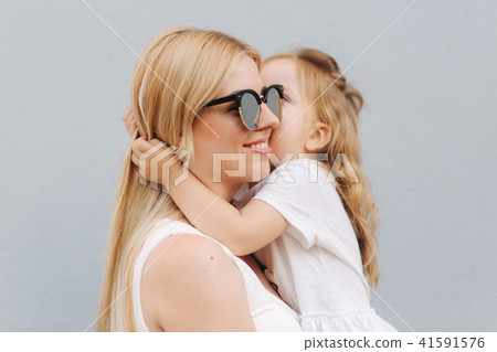 Happy mother and her little daughter in the summer day 41591576