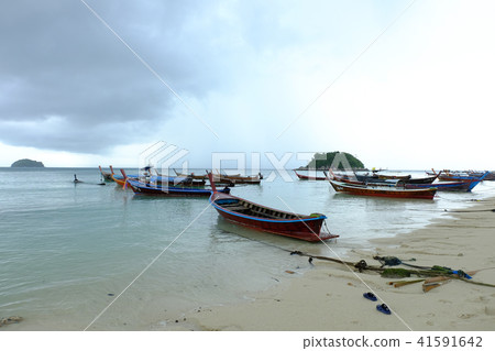 the beach and boat at the lipe island in the mo 41591642