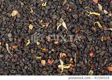 The composition of green tea gunpowder tea with slices. 41594328