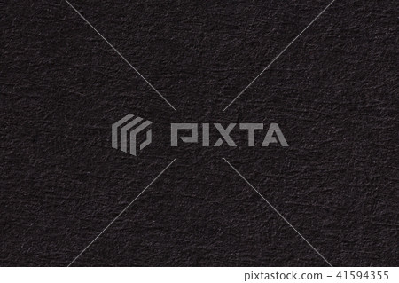 Black texture paper, close up. 41594355