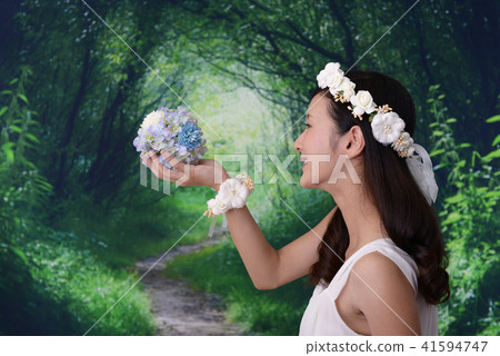 A woman in a dress A woman in a dress 41594747