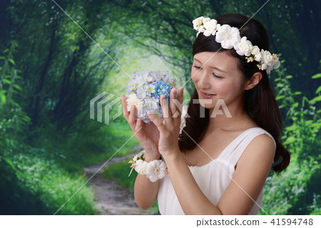 A woman in a dress A woman in a dress 41594748