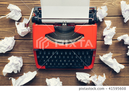 Vintage typewriter on wooden background 41595608