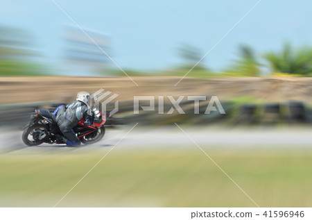 motion blur of the of a motorcycle racing running motion blur of the of a motorcycle racing running 41596946