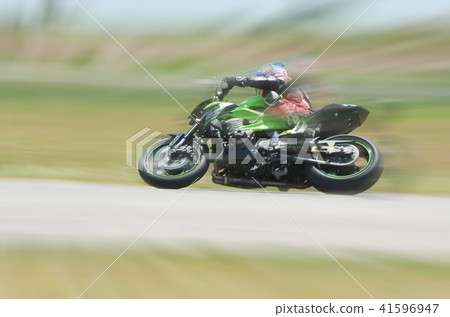 motion blur of the of a motorcycle racing running 41596947