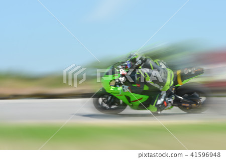 motion blur of the of a motorcycle racing running motion blur of the of a motorcycle racing running 41596948