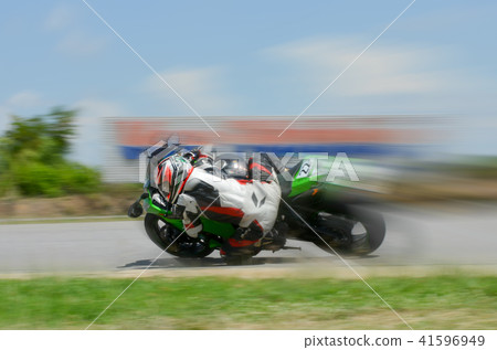 motion blur of the of a motorcycle racing running motion blur of the of a motorcycle racing running 41596949