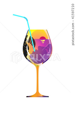 Girl drinks through a straw from a orange glass 41597210
