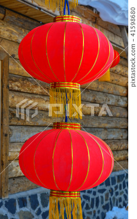 Red lantern at wooden house 41598680