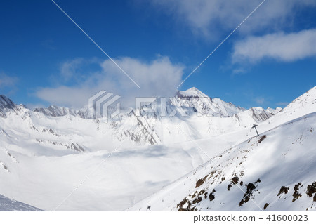 Off-piste slope and chair-lift on ski resort Off-piste slope and chair-lift on ski resort 41600023