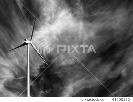 Wind turbine and black and white sky with clouds Wind turbine and black and white sky with clouds 41600120