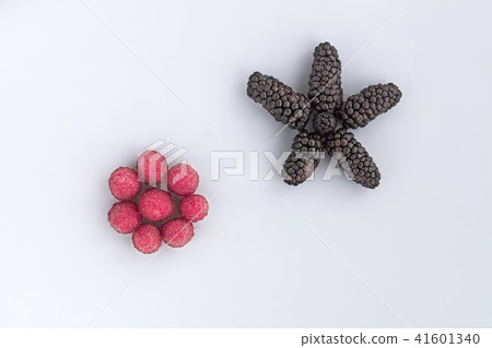 Raspberry and blackberry on a light background 41601340