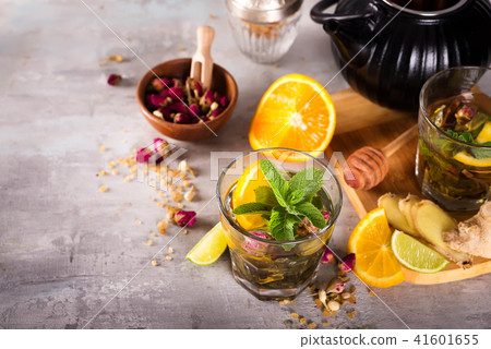 homemade flavored orange iced tea on stone background homemade flavored orange iced tea on stone background 41601655