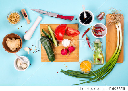 Healthy salad dressing ingredients in bowls: balsamic, mustard,olive oil and honey, top view. Healthy salad dressing ingredients in bowls: balsamic, mustard,olive oil and honey, top view. 41602856
