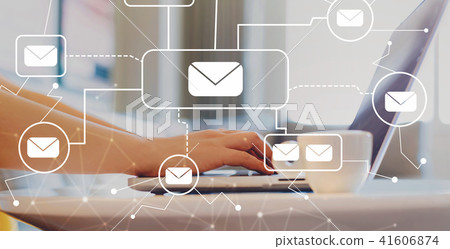 Emails with woman using a laptop 41606874