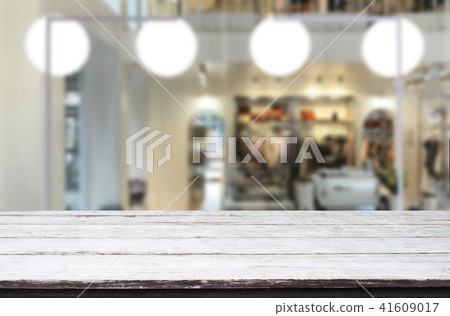 Selected focus empty brown wooden table and Coffee shop or resta 41609017