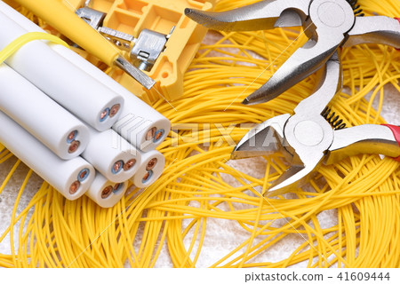 Tools and cables used in electrical installation 41609444