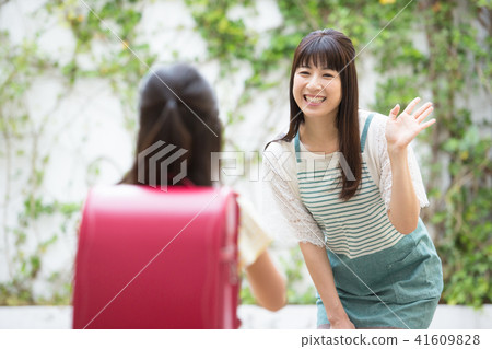 Mother and daughter  41609828