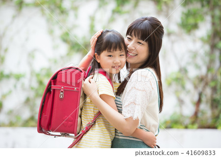 Mother and daughter  41609833