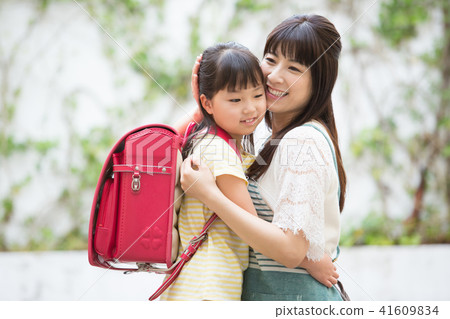 Mother and daughter  41609834