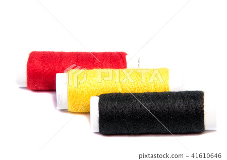 Colorful spools of thread isolated on white Colorful spools of thread isolated on white 41610646