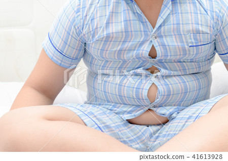 Obese fat boy overweight. Tight shirt 41613928