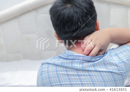 Boy scratch the itch with hand 41613931