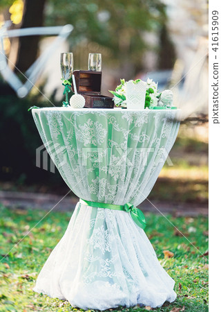 green wedding decorations. table decorated with a green cloth green wedding decorations. table decorated with a green cloth 41615909