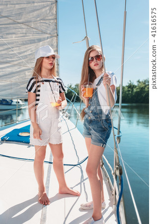 The children on board of sea yacht The children on board of sea yacht 41616575