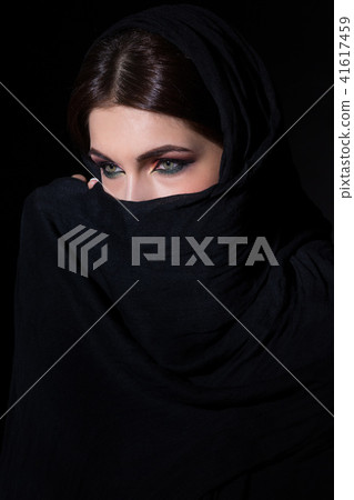 Woman in niqab Woman in niqab 41617459