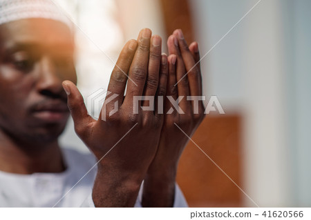 Muslim Man Is Praying In The Mosque Muslim Man Is Praying In The Mosque 41620566