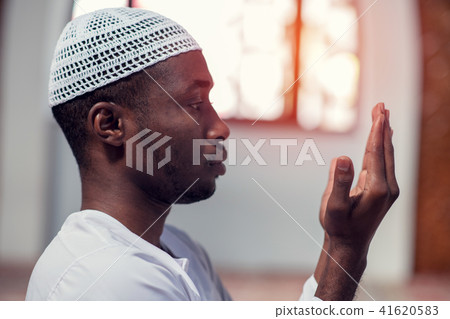 Muslim Man Is Praying In The Mosque 41620583
