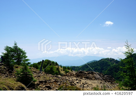 Walking along a pleasant ridgeline (Photo taken at Mt. Daibosatsu, near Jinbe Rock) 41620597