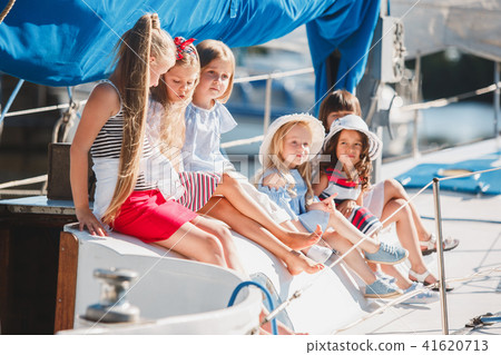 The children on board of sea yacht The children on board of sea yacht 41620713
