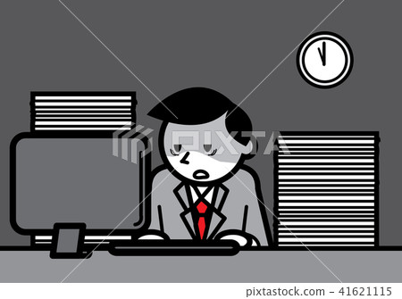 A tired office worker working overtime A tired office worker working overtime 41621115