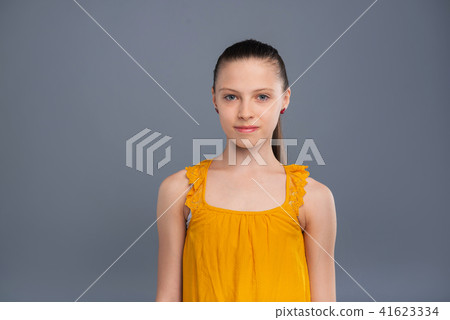 Portrait of a beautiful teenage girl in yellow tank-top 41623334
