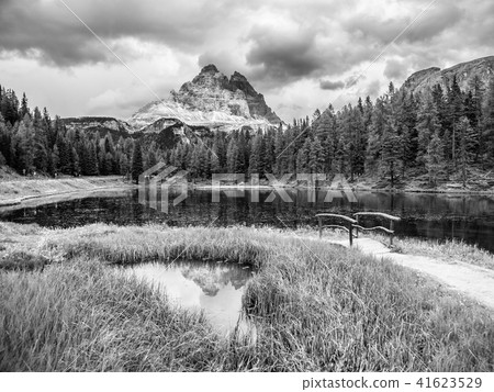 Tre Cime di Lavaredo Mountain reflected in water od Antorno Lake, Dolomites, Italy 41623529
