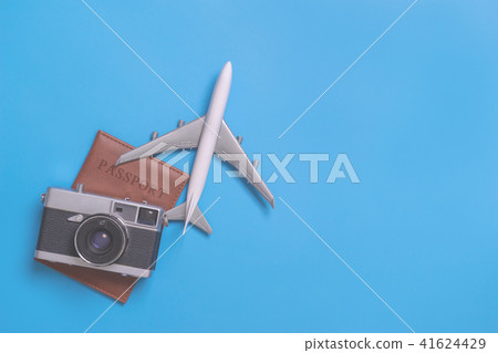 Travel objects for world travel on blue background Travel objects for world travel on blue background 41624429