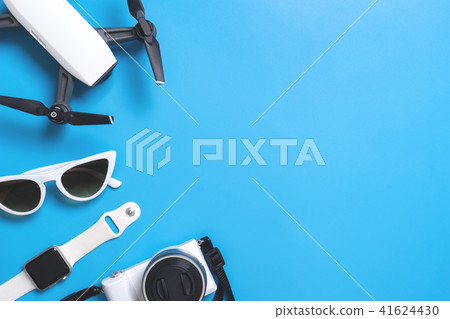 travel gadget and accessories on blue copy space travel gadget and accessories on blue copy space 41624430
