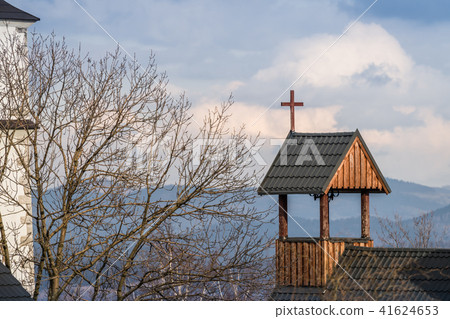 Cross on a wooden rooftop Cross on a wooden rooftop 41624653