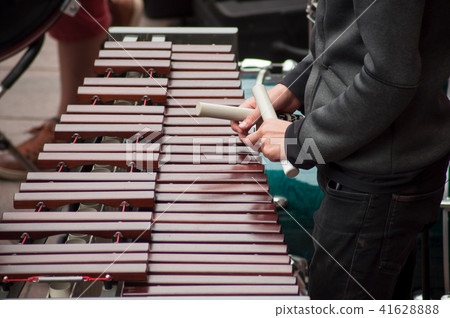closeup of xylophone player in the street closeup of xylophone player in the street 41628888