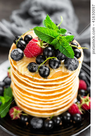 Pancakes with fresh berries 41630097