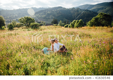 Couple in love walking in the mountains, having fun Couple in love walking in the mountains, having fun 41630546