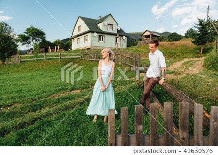 Couple in love walking in the mountains, having fun Couple in love walking in the mountains, having fun 41630576
