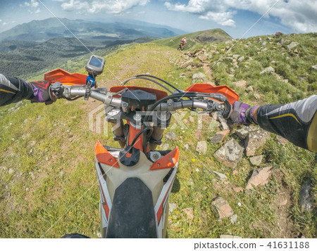 Extreme Adventure traveller with the dirt bike Enduro in high Caucasus mountains 41631188