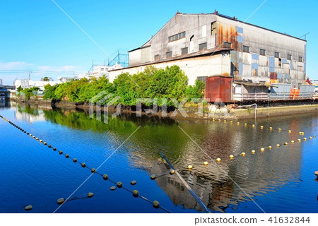 The canal near Murasame Bridge in Higashi-Kanagawa reflecting the blue sky The canal near Murasame Bridge in Higashi-Kanagawa reflecting the blue sky 41632844